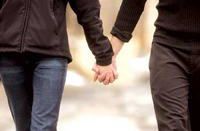 Couple holding hands